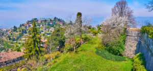 Panorama of Castello di San Vigilio rampart, garden and Monte Ba